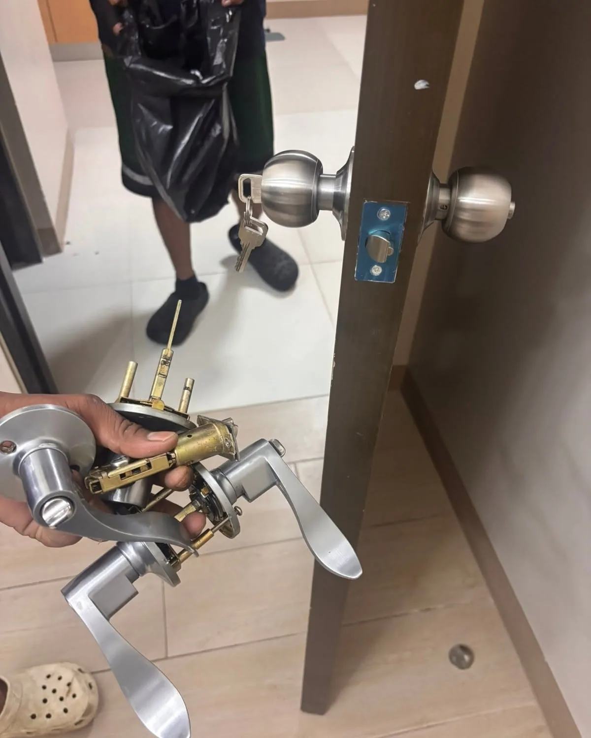 Door knob lock disassembled during a lock rekey
